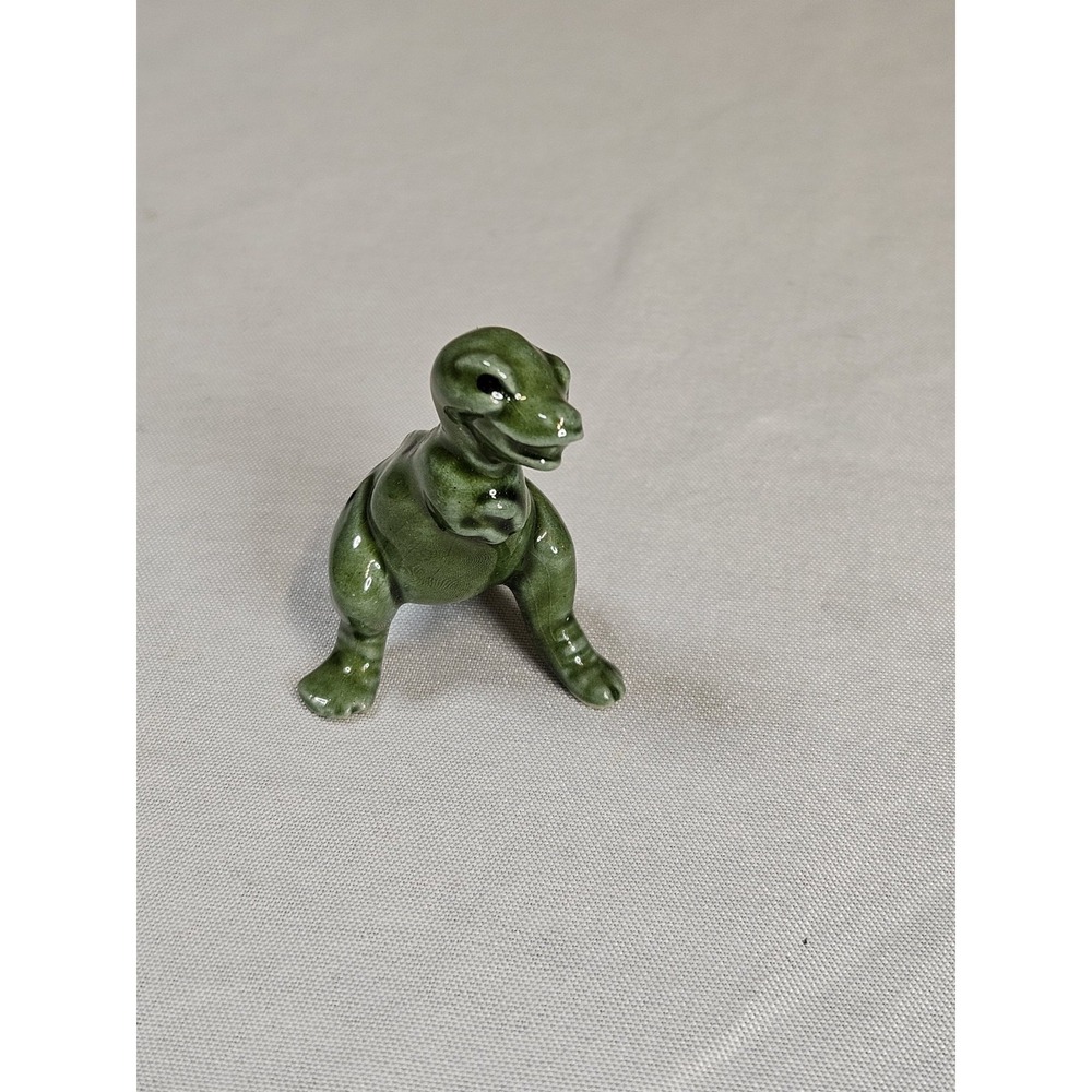 vintage ceramic Tyrannosaurus Rex miniature figurine produced by Hagen-Renaker.